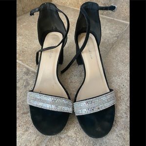 Stylish Silver and black sandals.